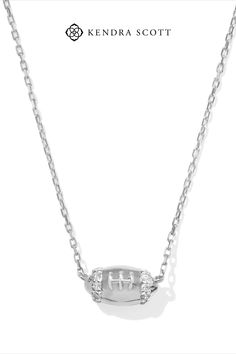 As stunning as it is spirited, the Tiny Diamond Football 14k White Gold Pendant Necklace in White Diamond is ready to get in the game. An heirloom-quality 14k gold football is striped with dainty white diamonds for an all-star level of shine. Paired with a jersey or fancy fit, you’ll win every game day wearing this elevated pendant. We have taken steps to ensure that, when applicable, our diamonds are conflict free by requiring our suppliers to comply with the Kimberley Process. Gold Football, Dainty Jewelry Necklace, Engagement Rings Sale, White Gold Pendant Necklace, Sports Jewelry, Bar Jewelry, White Gold Pendant, Tiny Diamond, Initial Jewelry