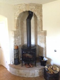 an old fashioned wood burning stove in a living room