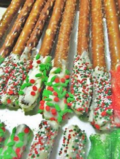 several different types of pretzels are arranged on a tray with sprinkles