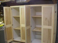 the unfinished cabinets are ready to be built into the wall and put together for storage