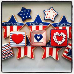 decorated cookies in the shape of stars and stripes with thank you written on one side