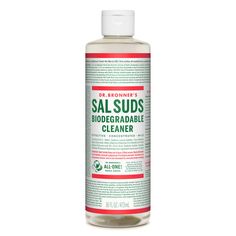 a bottle of sal suds on a white background with red and green labels in it