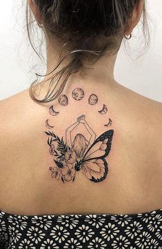 a woman with a butterfly tattoo on her back