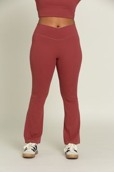 Feel effortlessly on trend for your workout class or a day on-the-go with our Pale Red Flare Yoga Pants. The crossover waistband provides an elevated look, offering you both security and comfort for any activity. The flare leg creates an unrestricted yet chic design. Pair with our Pale Red Square Neck Long Sleeve Top for the perfect set. Moisture-wicking Wide Leg Activewear For Sports, Red 4-way Stretch Activewear For Training, Red Activewear With 4-way Stretch For Training, Red Fitted Sweatpants For Athleisure, Red Athleisure Sweatpants For Gym, Athleisure Red Sweatpants For Gym, Moisture-wicking Wide Leg Athleisure Activewear, Wide Leg Moisture-wicking Athleisure Activewear, Moisture-wicking Wide Leg Activewear For Athleisure