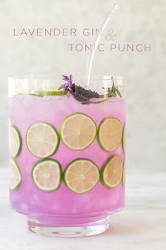 This Lavender Gin and Tonic Punch is light and refreshing! It's naturally flavored and the beautiful purple color is from butterfly pea tea. #Gin #Tonic #Lavender #Cocktail #Lime #Purple #Punch #Recipe Lychee Lavender Cocktail, Butterfly Themed Drinks, Flower Themed Cocktails, Tea Party Beverages, Lavendar Drinks Cocktails, Lavender Gin And Tonic, Lavendar Birthday Party, Pastel Cocktails, Pink Cocktail Aesthetic