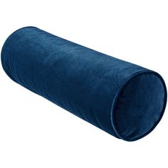 a large blue tube pillow on a white background with clippings to the side