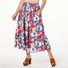 Jaclyn Smith Printed Pull-On Full Circle Midi Skirt  A free-spirited vibe is yours with this long, pleated skirt from Jaclyn Smith. The twirly, full circle shape and bold, playful print gives this billowy piece a flirty feel. Go on and give it a twirl! Floral Print Flowy Skirt, Pleated Flared Skirt For Vacation, Wide Leg Pleated Skirt With Elastic Waistband For Spring, Floral Print Full Skirt Bottoms For Day Out, Bohemian Gathered Skirt Bottoms For Day Out, Bohemian Gathered Skirt For Day Out, Floral Print Full Skirt Bottoms For Vacation, Long Pleated Vacation Skirt, Pleated Long Skirt For Vacation