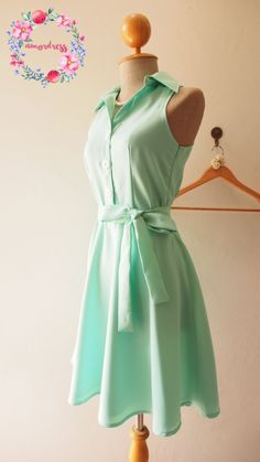 "*Cap sleeve option is available. Please check last image of cap Sleeve style* Mint green is one of the popular shade nowadays. This dress has featured modern vintage design with lovely shade of solid color mint green. There's side zipper and front button. The skirts fully lined. This is a nice one for day both casual look and working look to special event like bridesmaid in a wedding, all type of day and night party. ✄ MATERIAL ✄ **Amena fabric **Lining material **Plastic button ✄S I Z E ✄ Plea Chic Green A-line Shirt Dress, Elegant Light Green Short Sleeve Dress, Elegant Light Green Dress With Short Sleeves, Green Collared Mini Dress For Daywear, Elegant Green Shirt Dress With Short Sleeves, Green A-line Dress With Buttons, Green Fitted A-line Shirt Dress, Elegant Green Shirt Dress With Buttons, Vintage Green Collared Dress