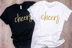 Cheers T-Shirt. Gold Glitter Design. Unisex Shirt. *Black and white t-shirts displayed on main photo. *Also available in long sleeve. Shirt is unisex, soft and TTS. If you prefer a more fitted look, size down one. If you would like a different glitter color, see attached glitter color chart and send as a note on the order. *Listing is for the shirt only (props are not included). --------------------------------------------- PROCESSING TIME: 3-5 business days (M-F) before an item ships. If you ne New Years Eve Shirts, T-shirt Display, New Years Eve Shirt, Cheer Tshirts, Shirt Display, Black And White T Shirts, Cheer Shirts, Black And White Shirt, T-shirts & Tank Tops