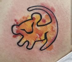 a tattoo with an image of a lion on it's back side ribcage