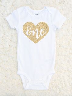 First Birthday Outfit Girl - First Birthday One Heart Shirt - Baby Girl Birthday One Piece - Birthday Girl Glitter 1st Birthday Tshirt EXCITING NEWS! ALL orders to the US are now sent via USPS and come with tracking Let everyone know your little girl is "ONE" in this super adorable heart glitter one piece bodysuit! Great for a cake smash/first birthday photoshoot! We can also customize number in the heart if your little one is celebrating a second, third, etc birthday (Size 2, 4 and 6 Tshirts av One Piece Birthday, One Piece Birthdays, First Birthday Outfit Girl, First Birthday Shirt, Heart Glitter, Birthday One, First Birthday Outfit, First Birthday Shirts