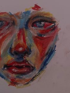 a painting of a man's face with red, blue and yellow colors