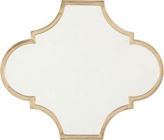 a white and gold mirror with an intricate design on the front, against a white background