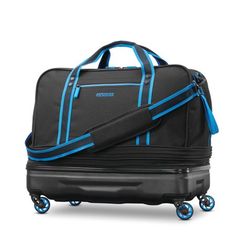 American Tourister's new hybrid duffel design expands when more room is needed. It offers a large packing compartment and built sturdy with in-line wheels, making it easy to maneuver. It has easy interior access zip opening, large main compartment and side pocket compartment for easy access to your essentials while traveling. Size: Expandable Duffel. Color: Black. Traveling Hacks, Duffle Bag With Wheels, Black Duffel Bag, Carryon Luggage, Rolling Duffle Bag, Shopify Marketing, Kids Gym, Traditional Jacket, Travel Things