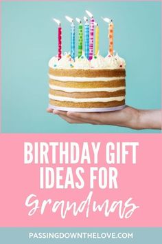 a hand holding a birthday cake with candles on it and the words, birthday gift ideas for