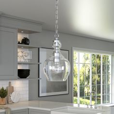 With a style inspired by the industrial revolution but appropriate for a coastal beach cottage, this pendant light is a chic update on a classic look. The domed glass shade is complemented with warm metallic accents that pair effortlessly with your existing color scheme. The hanging chain is fully adjustable to a length of up to 6 feet, allowing you to customize the fixture to your unique space. Hailey Home Verona Brushed Nickel Transitional Clear Glass Drum Mini Hanging Pendant Light | PD1077 Barndo Decor, Coastal Pendant Lighting, Clear Lamp, Brushed Nickel Kitchen, Lamp With Glass, Sink Lights, White Kitchens, Lamp Desk, Everyday Quotes