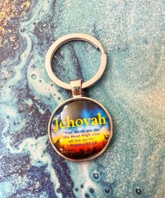 a keychain with the words jehovah on it