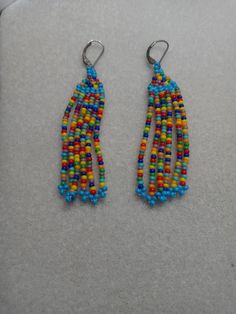 Multicolor fringe earringsmade with glass Czechoslovakian beads Rainbow Tassel Dangle Earrings, Rainbow Dangle Tassel Earrings, Multicolor Fringe Chandelier Earrings For Gift, Rainbow Fringe Dangle Earrings, Rainbow Fringe Dangle Jewelry, Rainbow Dangle Earrings With Fringe, Rainbow Fringe Earrings As Gift, Multicolor Fringe Beaded Drop Earrings, Multicolor Fringe Dangle Earrings