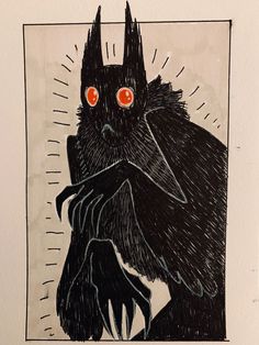 a drawing of a black bird with red eyes