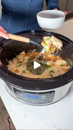 a woman is stirring food in an instant pot