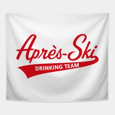 the logo for apres ski team on a white wall hanging in front of a gray background