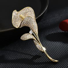 Brooches -Mini Suit Cubic Zirconia Brooch Multifunctional Creative Tulip Brooch Clothing Accessories Style: Cute/Romantic Shape\pattern: Flower Metals Type: copper Material: Cubic Zirconia Item Type: Brooches Gender: Women Brooches Type: Brooches Model Number:1005004974335111 Gold Flower Brooch Lapel Pin, Elegant Gold Flower Lapel Pin, Elegant Rose Gold Lapel Pin Brooch, Elegant Gold Flower Brooch, Elegant Gold Flower Brooches, Gold Flower Brooch Pins, Mini Suit, Mini Suits, Accessories Style