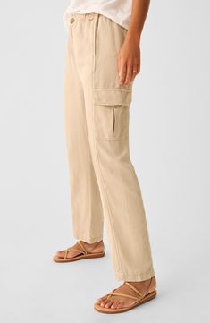 Comfy cargo pants for kicked-back days are cut from linen-kissed twill with an elastic waistband and roomy pockets lending a cool utility vibe. Zip fly with button closure; elastic waist Front and back welt pockets; cargo patch pockets 49% Tencel® lyocell, 28% linen, 21% cotton, 2% elastane Tencel lyocell is a more-sustainably produced fiber made with closed-loop processing Machine wash, tumble dry Made in Turkey Cargo Styling, Womens Packing List, Elastic Waistband Pants, Practice Outfits, New Pant, Independent Women, Cargo Pant, Skirt Pants, Cargo Pants