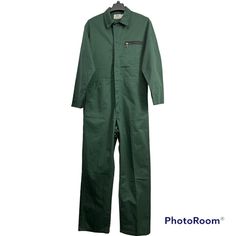 Vintage Coveralls Green Riverside Sz Medium Green Mechanic Workshop Made In Usa Nwot Condition: New Without Tags Measurements (Taken With Garment Lying Flat): Chest (Around): 43" Sleeve Length: 22.5" Shoulder To Shoulder: 19" Waist (Around): 36" Inseam: 31" Details: Double Side Pockets, Zippered Chest Pocket, Arm Pocket For Pencil / Pen, 2 Back Pockets, Back Elastic Waist, Button, And Zipper Closure, Long Sleeves, Back Elastic Waist, Polyester Blend (Permanent Press), Made In Usa Tags: Mechanic, Full Length Overalls With Pockets For Work, Green Long Sleeve Cotton Jumpsuits And Rompers, Green Long Sleeve Cotton Jumpsuit, Green Cotton Long Sleeve Jumpsuits And Rompers, Green Cotton Long Sleeve Jumpsuit, Green Cotton Utility Overalls, Green Utility Overalls For Workwear, Green Utility Jumpsuit For Workwear, Green Utility Jumpsuits And Rompers For Work