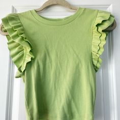 Light Green Zara Ruffled Ribbed Cropped Tee . Nwt And Never Worn Solid Color Crew Neck Top With Ruffles, Trendy Crew Neck Knit Top With Ruffles, Stretch Knit Top With Ruffles Crew Neck, Stretch Crew Neck Knit Top With Ruffles, Trendy Stretch Tops With Ruffle Hem, Ruffled Crew Neck Knit Top, Crew Neck Knit Top With Ruffles, Chic Crew Neck Ruffle Knit Top, Chic Crew Neck Knit Top With Ruffles