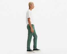 Levi's® XX Chino;don't call them khakis. Our XX Chino Slim Taper Pants are softer, with just the right amount of stretch. Super clean and slim throughout, they'll keep you casually put together without looking like you tried too hard. A modern take on the classic chino Made with supersoft fabric Versatile fit that tapers down to the ankle Woven with a hint of stretch for all-day comfort and easy movement Features a hidden zip-secure pouch in the right pocket Levi's Casual Bottoms With Hip Pockets, Levi's Casual Cargo Pants, Levi's Casual Cotton Pants, Casual Levi's Cotton Pants, Casual Green Work Pants With Hip Pockets, Levi's Straight Fit Cotton Bottoms, Levi's Green Cotton Bottoms, Casual Work Pants With Five Pockets, Levi's Casual Tapered Leg Pants