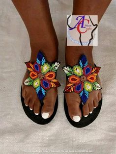 This beautiful Elegant Sandal is a beaded sandal made by Kenyan. Its unique very comfortable worn in every occasion.  I encourage my customers like you to order from my listing which are discounted and will be shipped via DHL Express.  You will receive your product with 5-7 days Bohemian Multicolor Flip Flops For The Beach, Beaded Sandals For Summer Vacation, Summer Vacation Beaded Sandals, Beaded Sandals For Beach Season Vacation, Bohemian Beaded Sandals For The Beach, Bohemian Beaded Sandals For Vacation, Casual Adjustable Beaded Sandals, Handmade Casual Beach Sandals, Handmade Sandals For Beach Season