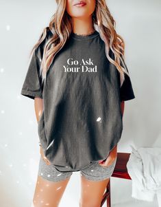 This cozy sweatshirt features a playful embroidered message that reads "Go Ask Your Dad." It's the perfect blend of comfort and humor, making it an ideal gift for moms who want to gently remind their kids who to turn to with their endless questions. ORDERING INFO  ALL ITEMS ARE SOLD SEPARATELY  HOW TO:  1. Choose the SHIRT COLOR from the 1st dropdown. 2. Choose the SHIRT SIZE from the 2nd dropdown. 3. Add each item to the cart.  💥If you are purchasing more than one item, complete this process as many times as needed.  VERY IMPORTANT 💥 SIZING AND FABRIC INFO: -- Unisex Shirt -- Sizing Info: These shirts are a unisex style meaning they tend to run wider/longer than women's styles might; however, if you are looking for the looser look, you might consider sizing up as they are true to size. Mom Tshirt, Toddler Mom, Shirts Funny, Cozy Sweatshirts, Christian Clothing, Look Plus, Mom Shirt, Mom Shirts, Unisex Shirt