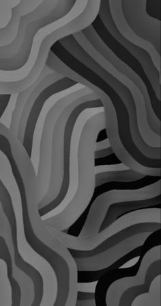 an abstract black and white photo with wavy lines