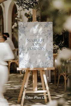 an easel with a sign that says margot and jamison on it