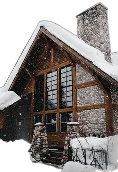 a log cabin with snow on the roof