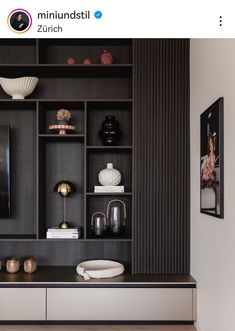 a living room filled with lots of furniture and decor