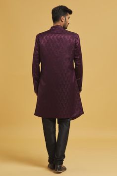 Wine sherwani with all over woven paisley pattern. Comes with churidar.
Components: 2
Pattern: Woven
Type Of Work: Paisley
Neckline: Mandarin Collar
Sleeve Type: Full
Fabric: Sherwani: Imp. Soft Jacquard, Churidar: Silk Dupion
Color: Wine
Other Details: 
Closure:
Sherwani: Button
Churidar: Drawstring
Note: Pocket square worn by model is not for sale
Occasion: Mehendi and Puja,Sangeet - Aza Fashions Green Sherwani, Buy Wine, Churidar, Jacquard Weave, Paisley Pattern, Mandarin Collar, Pocket Square, Aza Fashion, Sleeve Type