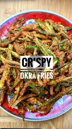 crispy okra fries on a red plate with the words crispy over it