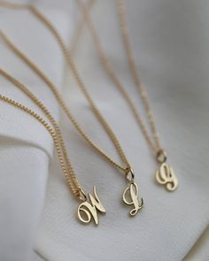 "Personalized 14k solid gold initials necklace. Simple, minimalist everyday necklace Perfect wearing alone or layering with your favorite necklaces. Each initial measures approx. 6.5mm, You can add up to 5 Initials Chain Length: 18\" Available in 14K Yellow Gold or 14K White Gold * Leave us your initials and placement in the comment box at checkout." Luxury Yellow Gold Initial Pendant Name Necklace, Initial Pendant Necklace With Curb Chain, Dainty 14k Gold Monogram Necklace, Dainty Charm Necklaces With Curb Chain For Gifts, Elegant Charm Necklace With Curb Chain As Gift, Elegant Curb Chain Charm Necklace Gift, Elegant Curb Chain Charm Necklace For Gift, Gift Necklace With Initial Pendant And Curb Chain, Minimalist Curb Chain Necklace For Anniversary