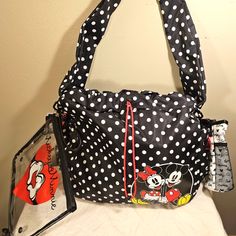 This Is A Bioworld Disney Mickey Mouse And Minnie Mouse Black Polka Dot Large Crossbody Travel Tote 15 X 14 Hydration Crossbody Bag With Bonus Multi-Use Pouch. And Hyradtion Cooler Included This Would Make A Great Gift For Anyone Who Loves Disney Or Fun, Cartoon-Themed Bags. New With Tags Black Minnie Mouse Travel Bag, Black Mickey Mouse Travel Bag, Black Minnie Mouse Bag For Everyday Use, Black Minnie Mouse Bag For Disney Trips, Disney Minnie Mouse Bag, Trendy Black Minnie Mouse Bag, Casual Minnie Mouse Bag For Everyday Use, Minnie Mouse Bags For Disney Trips, Black Waist Belt