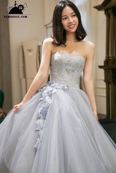 $158.99, Wedding Reception Dresses High Low Grey Tulle Strapless Wedding Party Dress Tea Length with Petals #E9824 at GemGrace. View more special Short Wedding Dresses,Wedding Reception Dresses,Reception Dresses now? #GemGrace To buy delicate gowns at affordable prices. Over 399 new styles added, shop now to get $10 off! Strapless Floor-length Dress For Weddings And Prom, Strapless Organza Wedding Gown, Strapless Wedding Dress For Banquet And Prom Season, Strapless Wedding Dress For Banquet, Strapless Tulle Bridesmaid Ball Gown, Strapless Tulle Gown For Banquet, Wedding Strapless Dress With Fitted Bodice In Organza, Floor-length Tulle Strapless Dress For Wedding, Strapless Ball Gown For Wedding And Prom Season