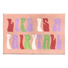 a pink rug with the words life is a furryie on it's side