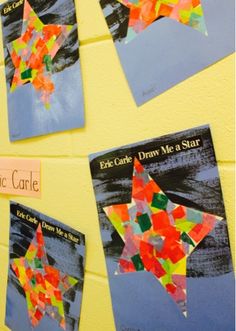 colorful paper stars are on the wall in front of a sign that says eric carlie draw me a star