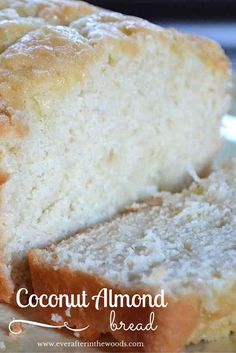 a loaf of coconut almond bread on a plate