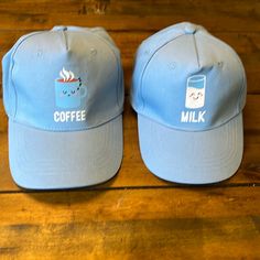 Mom And Little One Baseball Hat Combo Color Is Light Blue For Both, Child’s Hat Says Milk On Front Labeled As Size 4-6x Moms Hat ( Or Dads) Says Coffee On Front One Size Fits Most Both Have Velcro Adjustment On Back Both Are Nwot Very Cute Everyday Blue Brimmed Hat, Casual Light Blue Brimmed Hat, Cute Adjustable Blue Baseball Cap, Cute Blue Adjustable Baseball Cap, Cute Blue Baseball Cap With Curved Brim, Casual Light Blue Hat With Curved Brim, Cute Blue Baseball Cap, Cute Blue Hat With Curved Brim, Fun Blue Flat Bill Hat