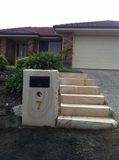 a house with steps leading up to the front door