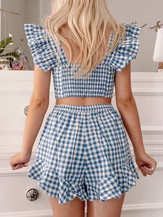 The Bluebell Ruffle Top from Sassy Shortcake is an adorable blue gingham with ruffle sleeves, a smocked back, and a button up front. The shorts feature a drawstring waist and ruffled hem. Gingham Set, Sassy Shortcake, Gingham Top, Gingham Shorts, Gingham Tops, Ruffle Shorts, Blue Gingham, Ruffle Sleeves, Short Set