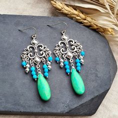 ∴ Boho Ethnic Earrings These earrings are made with beautiful silver coloured charms and blue and green beads. ∴ What you need to know » The earrings measure about 7.5 cm » See photos for a better idea of size If you like my shop but couldn't find exactly what you want, get in touch and we can come up with something together :) Handmade Gifts For Her, Earrings Turquoise, Green Beads, Earrings Bohemian, Ethnic Earrings, Bleu Turquoise, Bohemian Earrings, Lovely Necklace, Earrings Statement