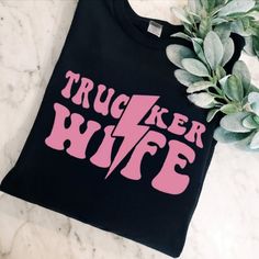 Cool Design ! Custom Made And Will Ship Within A Few Days! On Gildan Unisex Short Sleeve Check Out My Page For More Designs!:) Trucker Wife, Truckers Wife, Truck Driver, Cool Design, Unisex Shorts, Custom Made, Cool Designs, Black Pink, Womens Tops