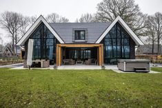 a house with a hot tub in front of it